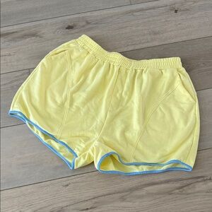 Amazon Yellow Athletic Shorts with Blue Edging